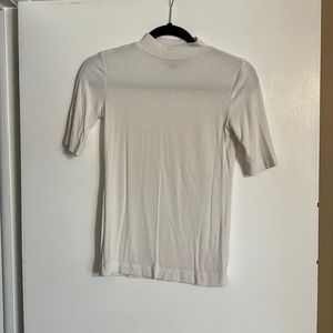 White half sleeve half turtleneck
